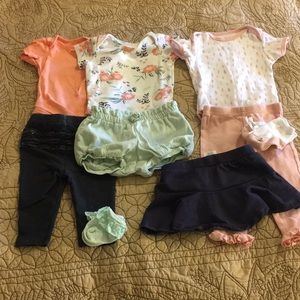 3 onesies, 2 pants, one skort one bubble shorts 6M